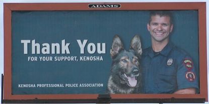 Wisconsin police billboard features officer on leave for shooting 2 people