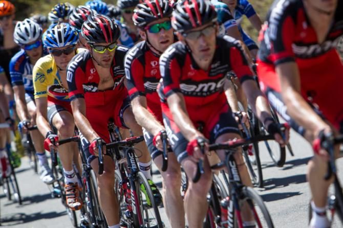 Tejay van Garderen (BMC) sits behind his team on the climb.