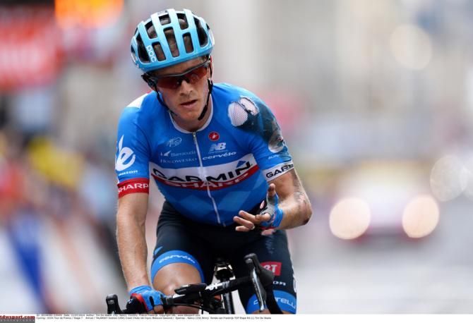 Andrew Talanksy (Garmin-Sharp) checks his hand for injuries