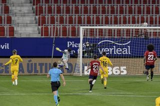 Barcelona’s Jordi Alba scores against Osasuna
