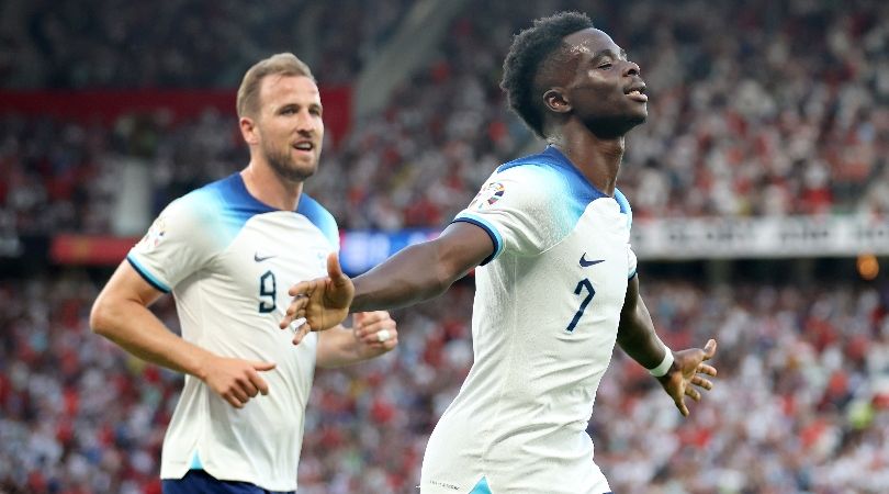 Bukayo Saka celebrates with Harry Kane after scoring for England against North Macedonia in June 2023.