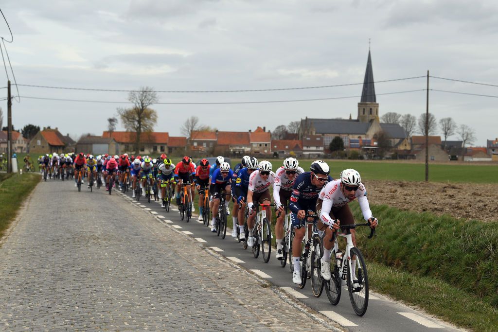WEVELGEM BELGIUM MARCH 28 Julien Duval of France and AG2R Citren Team Silvan Dillier of Switzerland and Team AlpecinFenix The Peloton during the 83rd GentWevelgem in Flanders Fields 2021 Mens Elite a 254km race from Ypres to Wevelgem Cobblestones GWE21 GWEmen FlandersClassic on March 28 2021 in Wevelgem Belgium Photo by Tim de WaeleGetty Images