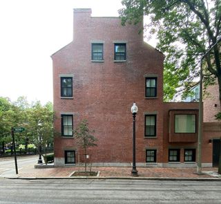 Majestic brick side view at the OverUnder House in Boston