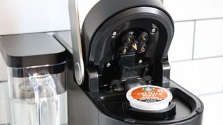 Keurig K-Supreme Coffee Maker review with K-Cup inserted