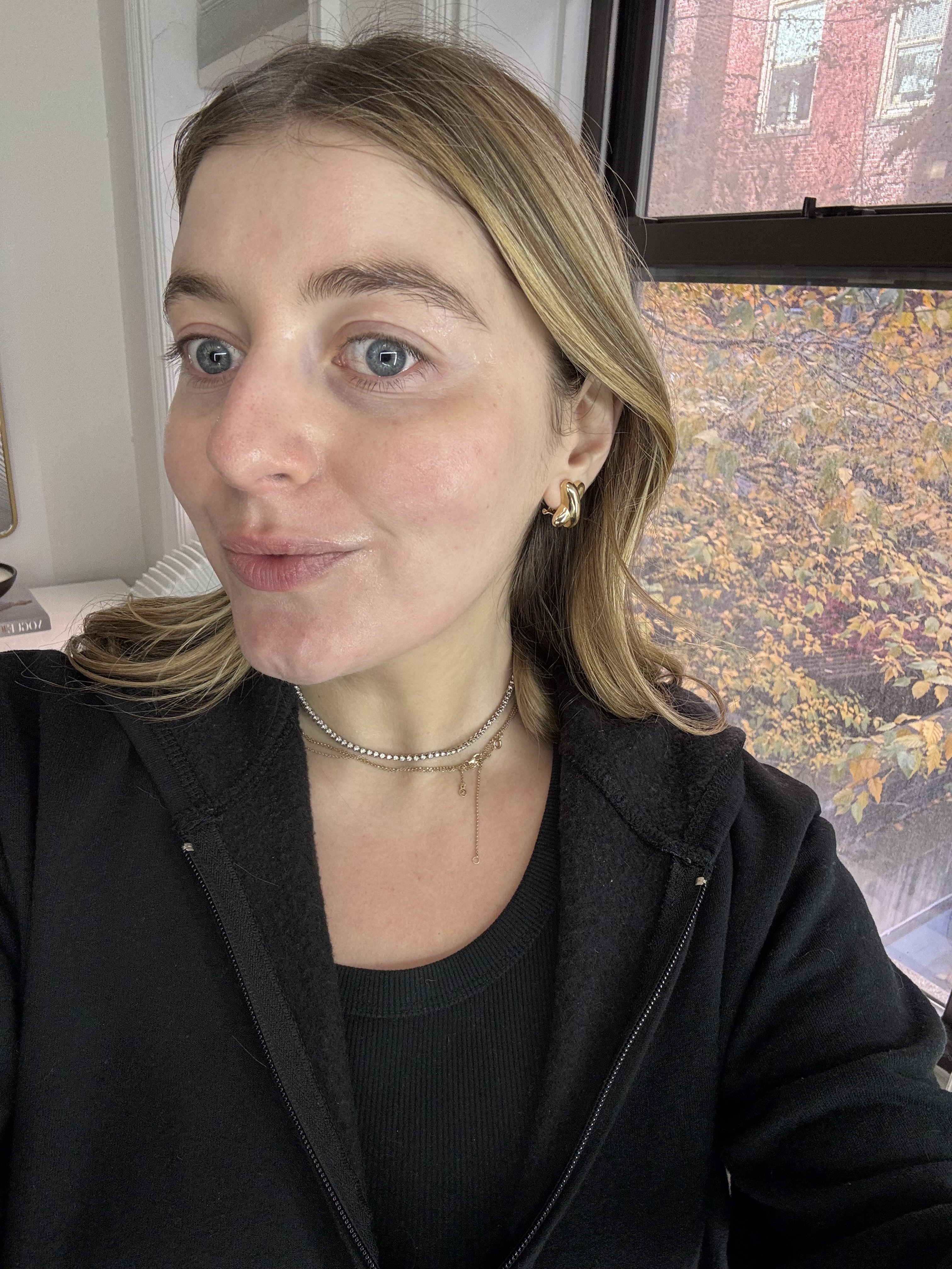 girl with blonde hair and glowing skin