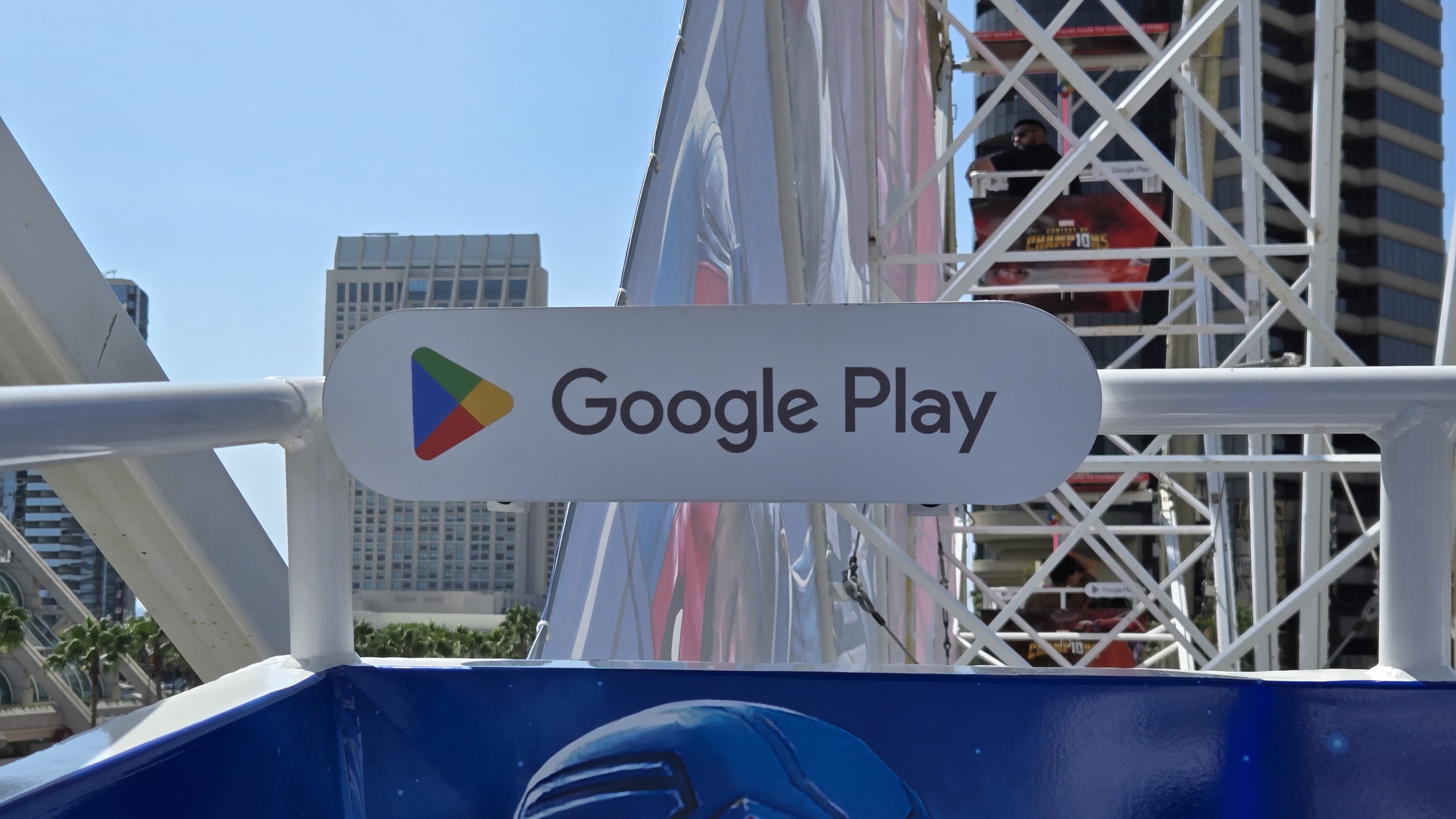 A Google Play sign on a Ferris wheel gondola