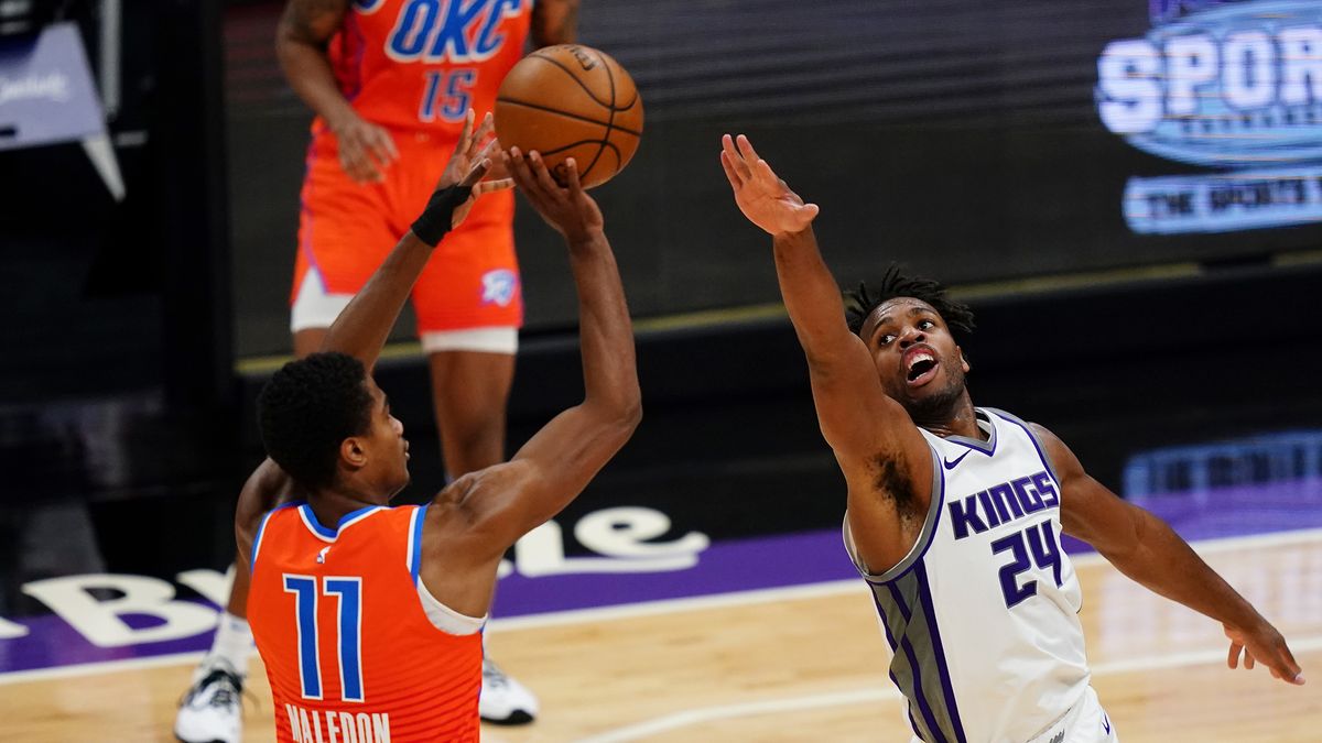 Sacramento Kings player Buddy Hield defends against a shot by the Oklahoma City Thunder&#039;s Theo Maledon during the game at Golden 1 Center on May 9, 2021 in Sacramento, California.