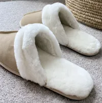 ASOS DESIGN premium sheepskin slipper in beige | £35 at ASOS