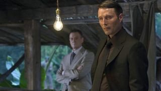 Jesper Christiansen and Mads Mikkelsen stand around while planning in Casino Royale.