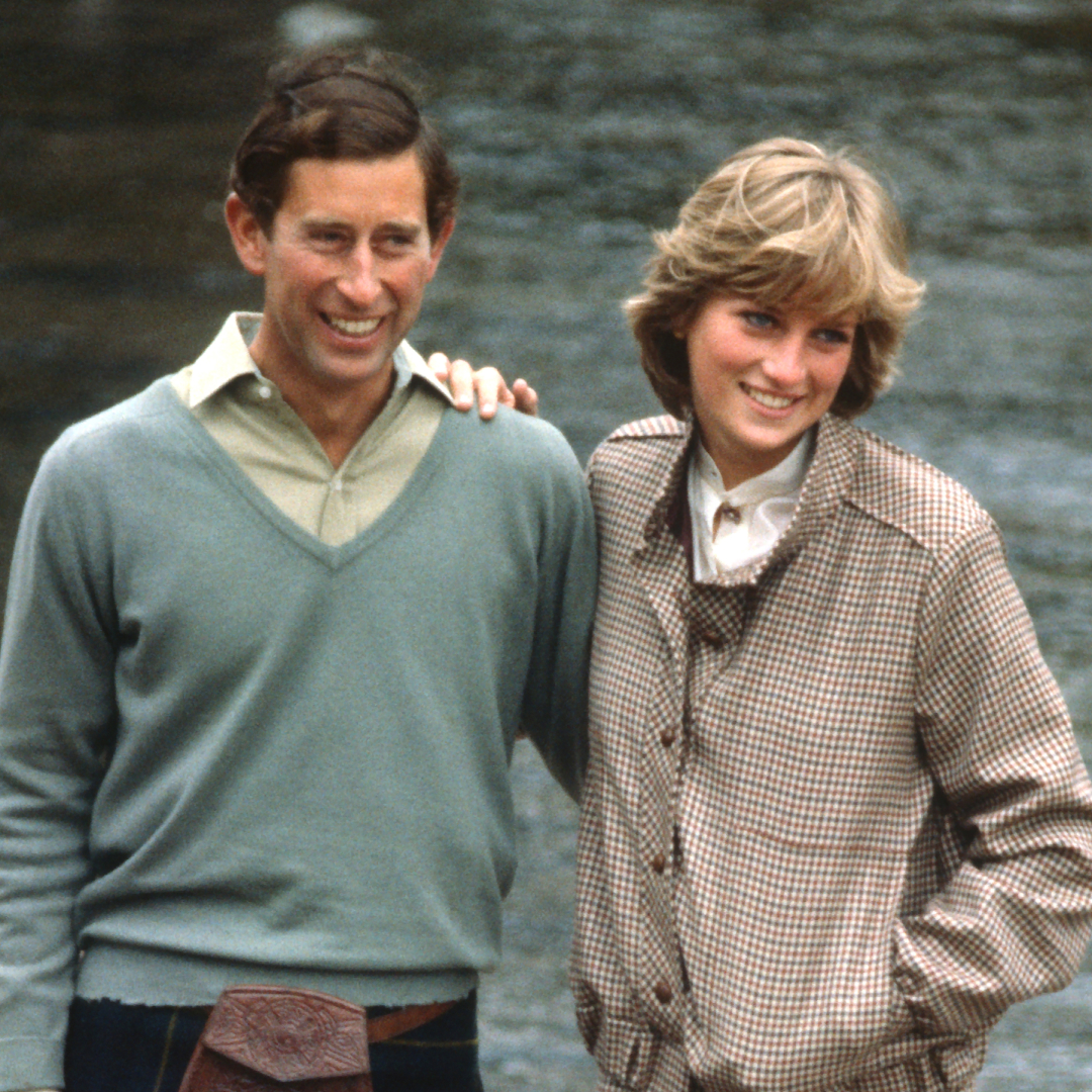 Princess Diana and Prince Charles posing in front of the river on their honeymoon