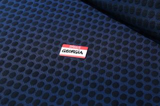 Coloured Byborre fabric with name tag on it which reads ‘Hello my name is Georgia’