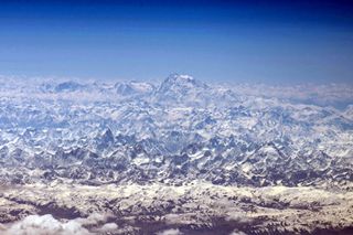 The peaks of the Himalayas, the highest mountains on Earth, as seen from the International Space Station by NASA astronaut Jeff Williams.