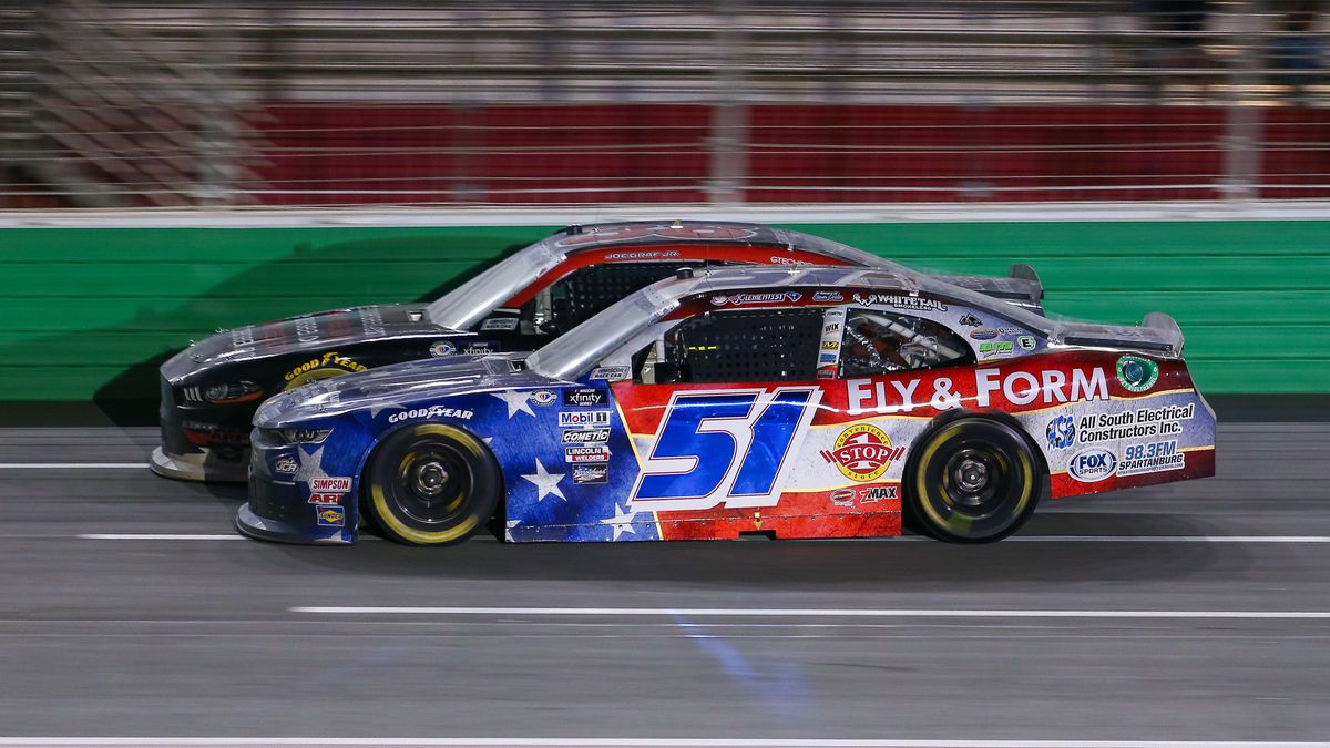 ATLANTA, GA - JULY 08: Jeremy Clements (#51 Jeremy Clements Racing Fly and Form Structures Chevrolet) and Joe Graf Jr. (#38 RSS Racing Getcoverseal.com Ford) race side by side during the NASCAR Xfinity Series Alsco Uniforms 250 on July 8, 2023 at Atlanta Motor Speedway in Atlanta, GA. (Photo by Chris McDill/Icon Sportswire via Getty Images)