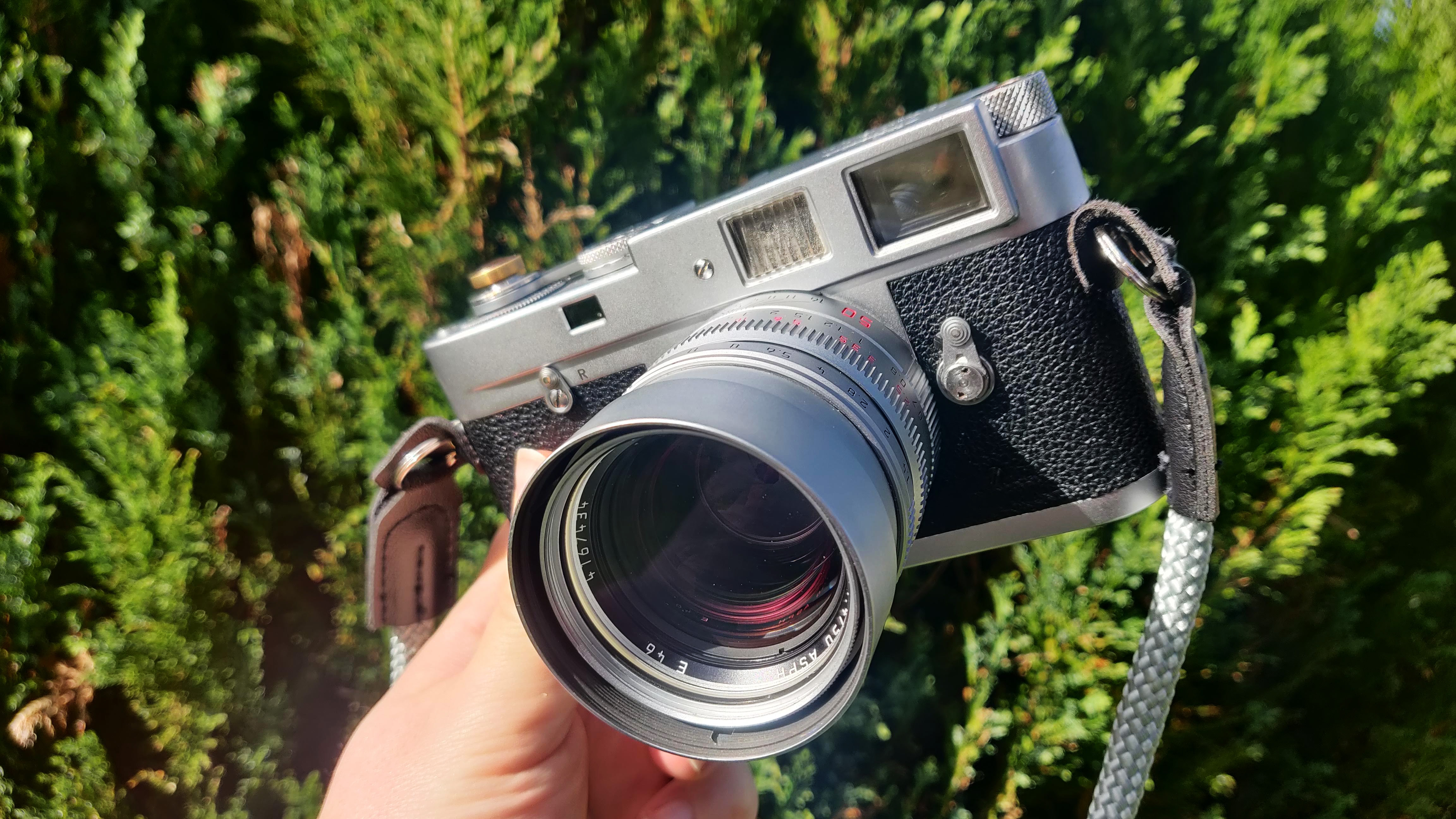 Leica M2 showing off a silver Leica 50mm Summilux attached