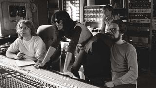 Producer Terry Brown, Geddy Lee, Alex Lifeson, engineer Paul Northfield in the studio