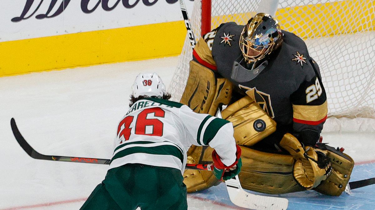 Vegas Golden Knights goalie Marc-Andre Fleury blocks a shot by Mats Zuccarello of the Minnesota Wild in overtime of game one of the first round of the 2021 Stanley Cup Playoffs at T-Mobile Arena on May 16, 2021 in Las Vegas, Nevada.