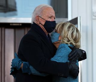 WASHINGTON, DC - JANUARY 20: U.S. President Joe Biden and First Lady Dr. Jill Biden embrace while standing at the North Portico of The White House after Biden's inauguration on January 20, 2021 in Washington, DC. Biden became the 46th president of the United States earlier today during the ceremony at the U.S. Capitol. (Photo by Chip Somodevilla/Getty Images)