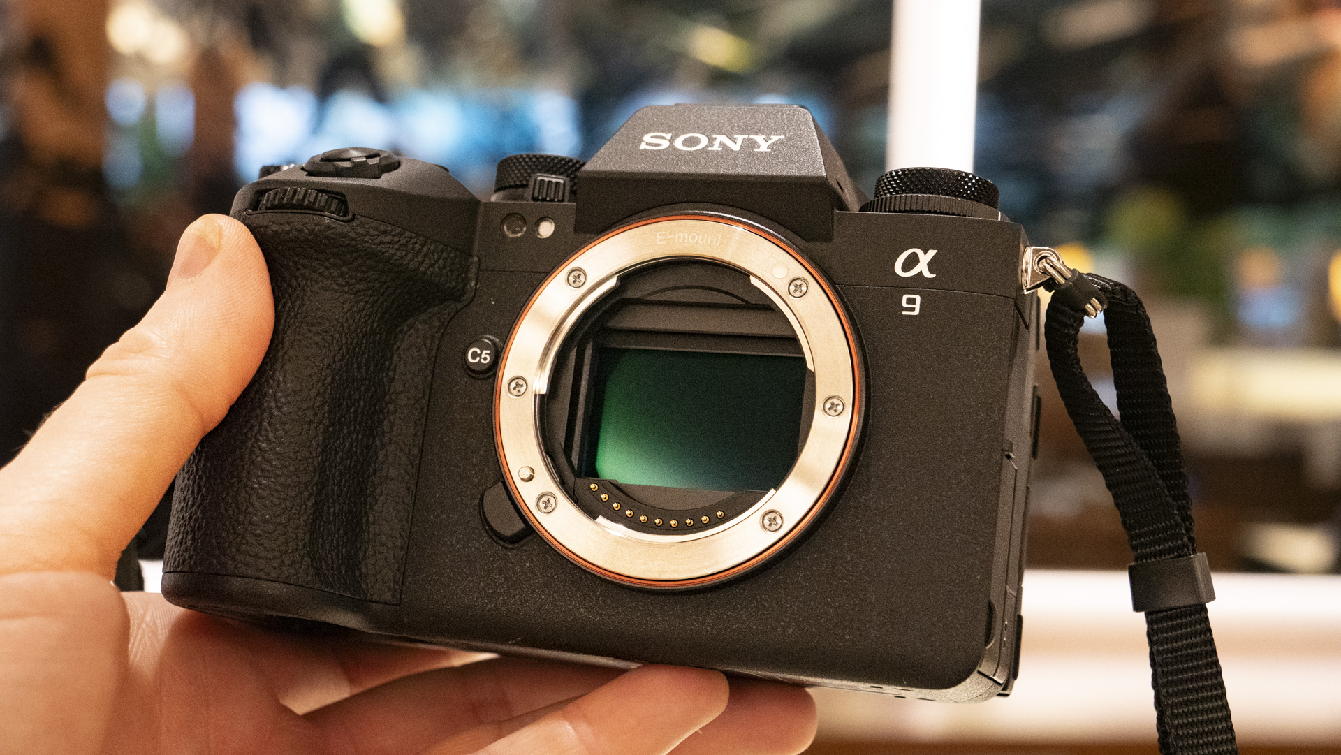 Sony A9 III no lens attached, in the hand and closeup of sensor