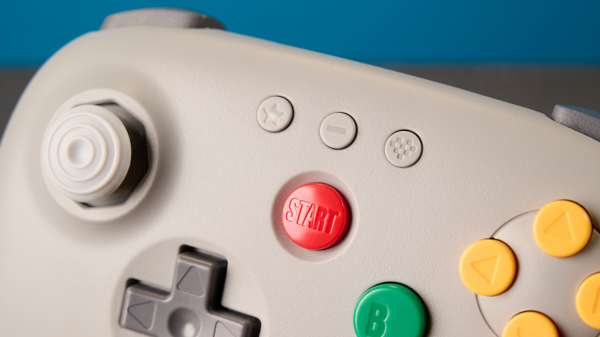 The 8BitDo 64 Controller against a blue background