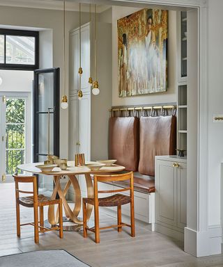 Breakfast room with dining table and leather back saddle