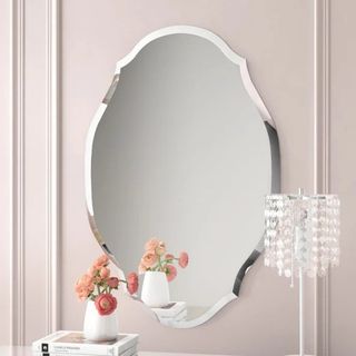 Vintage inspired, shapely wall mirror with beveled edge