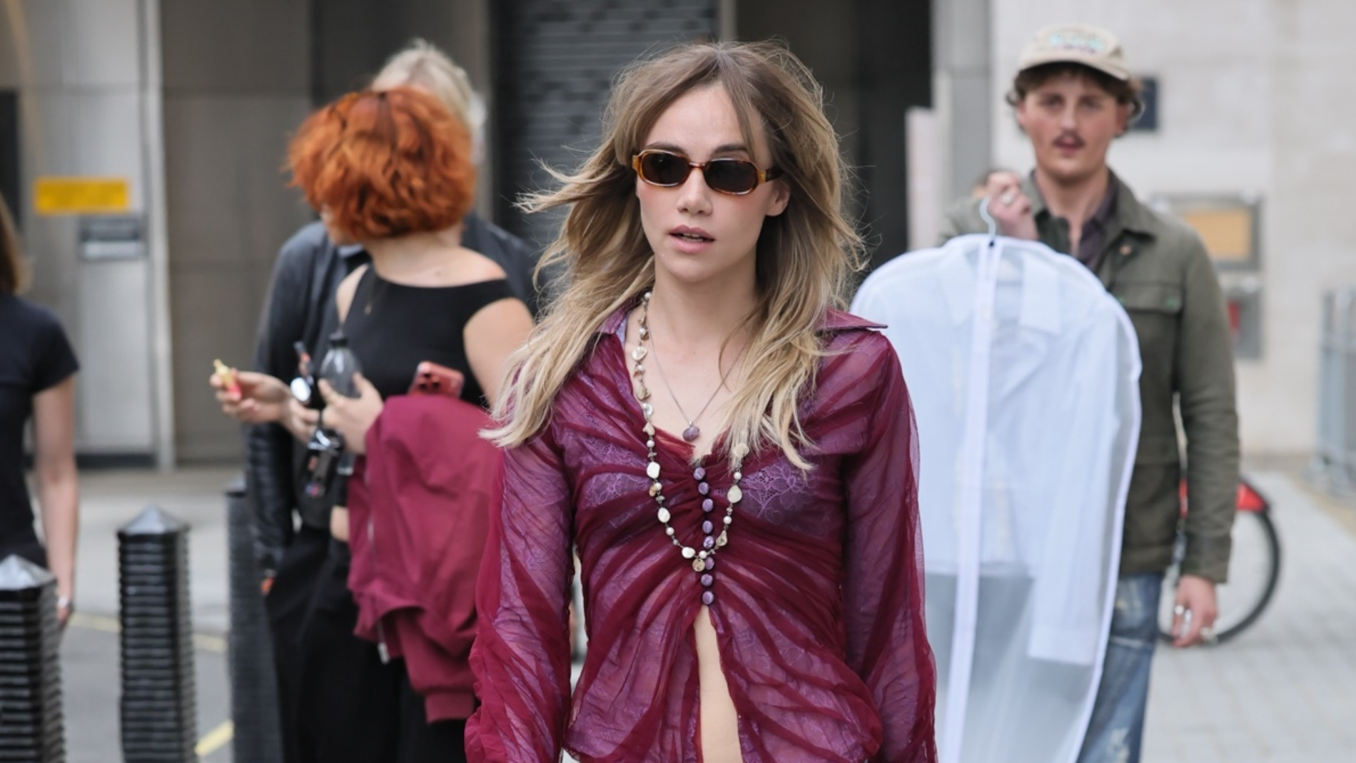  Suki Waterhouse wears a sheer top