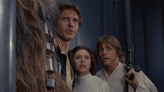 Harrison Ford, Carrie Fisher, and Mark Hamill wandering around the Death Star together in Star Wars.