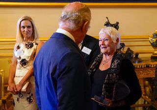 Dame Judi Dench is believed to share a good relationship with King Charles and Queen Camilla