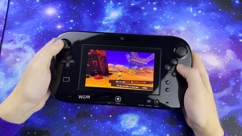 Switch Wii U Gamepad mod by KOUZEX with Splatoon gameplay on screen.