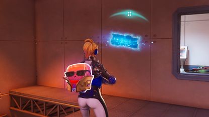 One of the Fortnite Cheat Codes glowing on a wall