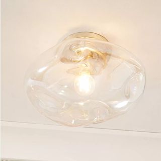 Sculptural Flush Mount on a white ceiling