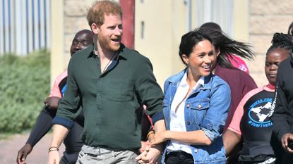 Meghan, Duchess of Sussex and Prince Harry, Duke of Sussex visit Waves for Change, an NGO, at Monwabisi Beach during their royal tour of South Africa on September 24, 2019 in Cape Town, South Africa. Waves for Change supports local surf mentors to provide mental health services to vulnerable young people living in under resourced communities. 