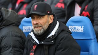 Liverpool manager Jurgen Klopp looks on from the bench during the Premier League match between Brighton & Hove Albion and Liverpool on 14 January, 2023 at the Amex Stadium in Falmer, United Kingdom.