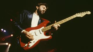 Guitarist, songwriter and vocalist Eric Clapton performing in Rome, Italy, 1986. He is playing a Fender Stratocaster guitar.