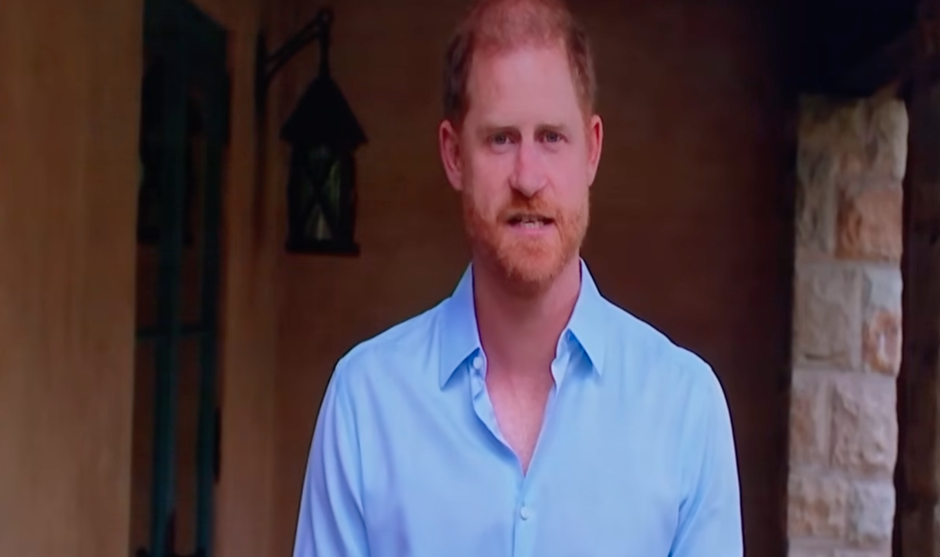 Prince Harry wears a blue shirt and has red hair and addresses participants in the Invictus Germany Sports Festival 2026