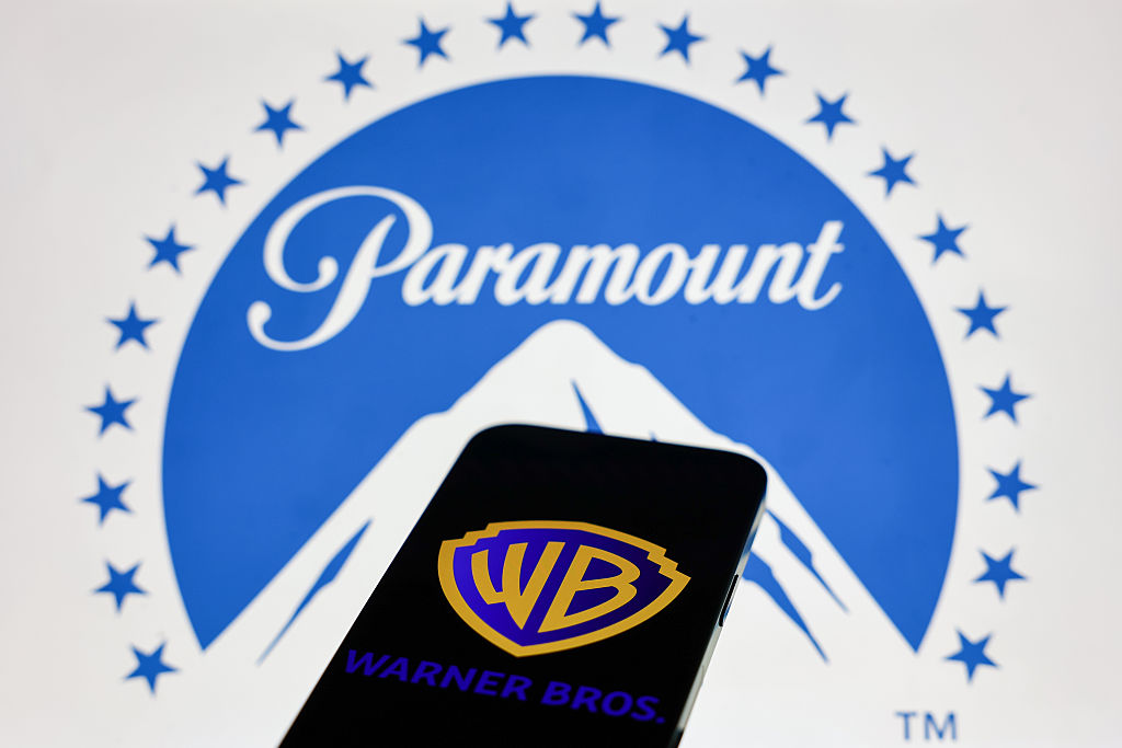 Paramount logo displayed on a laptop screen and Warner Bros logo displayed on a phone screen are seen in this illustration photo taken in Krakow, Poland on February 28, 2026. (Photo by Jakub Porzycki/NurPhoto)