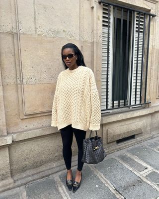 Basics to Wear With Leggings: @nlmarilyn wears a cream cable knit jumper with leggings