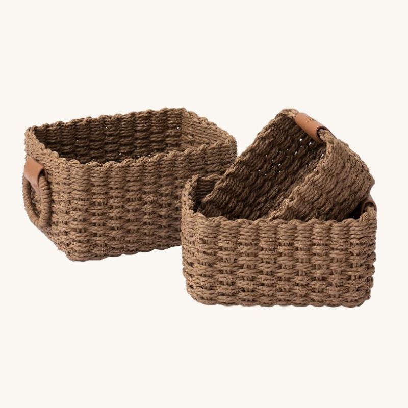 3 wicker baskets on a white background