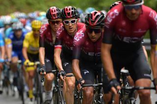 Geraint Thomas tucked in behind the Ineos train