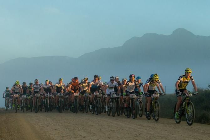 Mens Podium (LtoR) 3rd Christoph Sauser and Frantisek Rabon of Meerendal Songo Specialized, 1st Riccardo Chiarini and Roel Paulissen of Torpado Factory, 2nd Philip Buys and Nino Schurter of Scott-Odlo MTB Racing