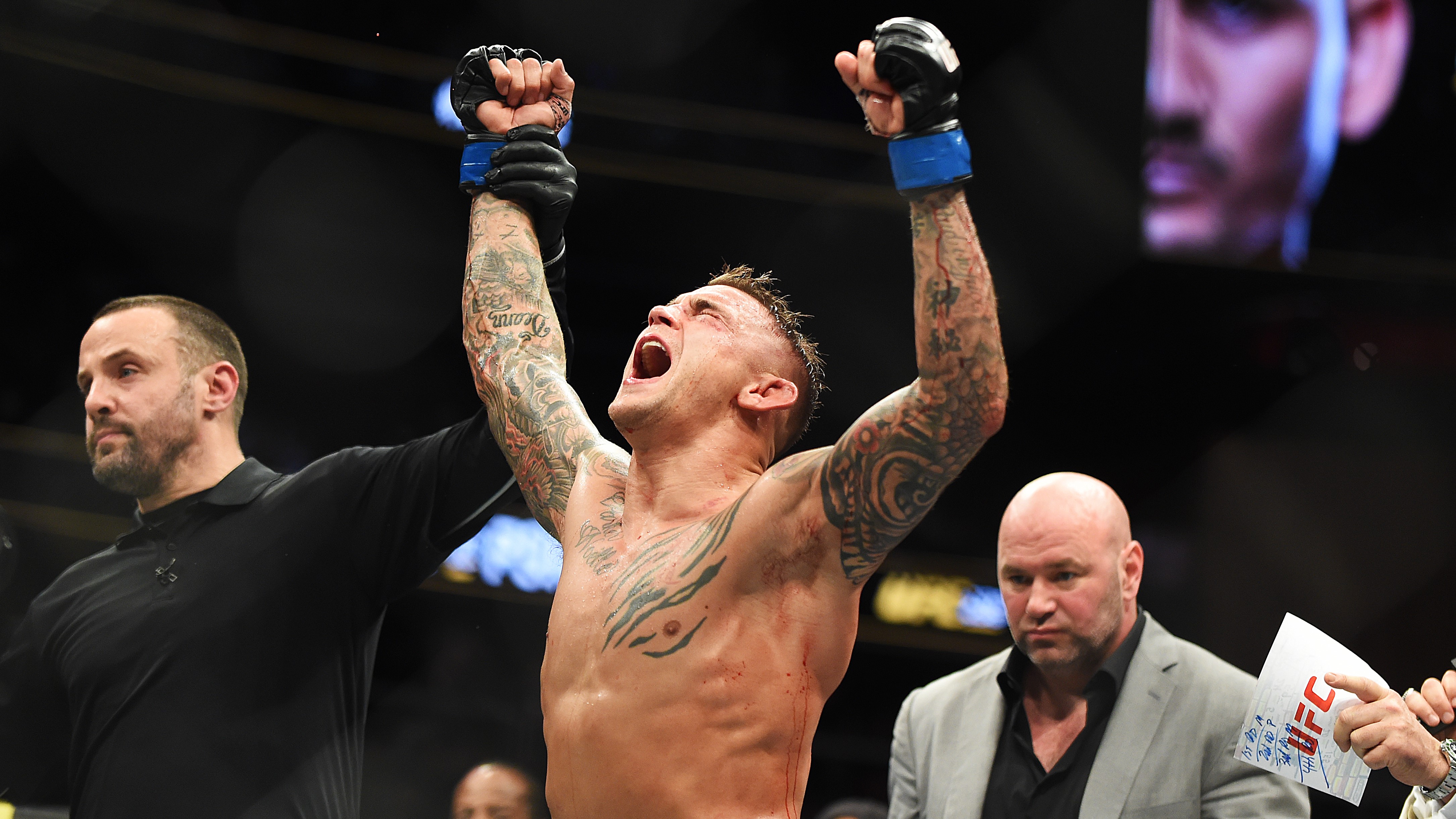 Dustin Poirier celebrating a UFC victory