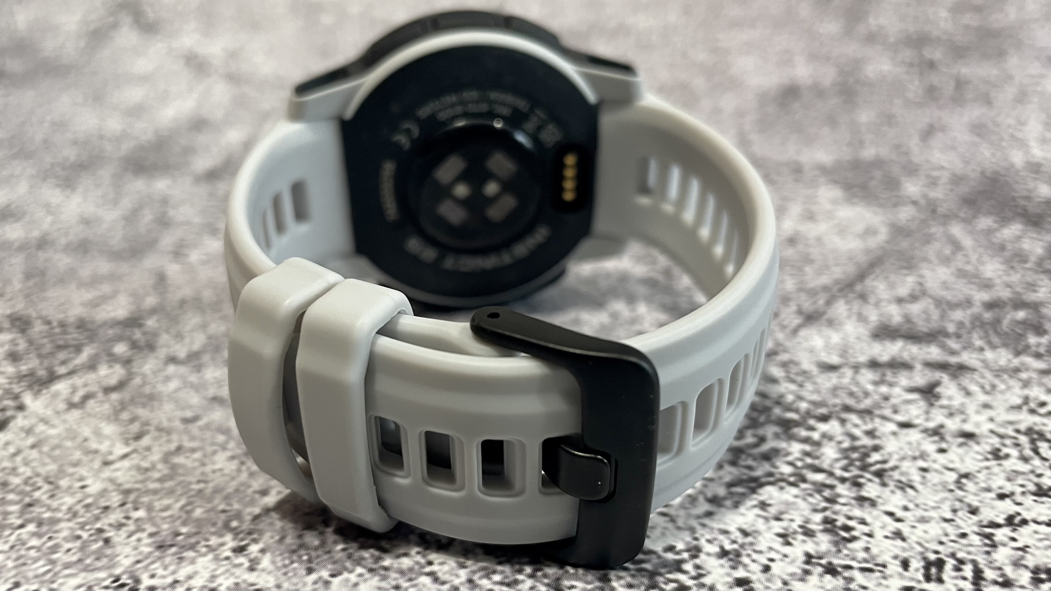 Garmin Instinct 2 with white case and band