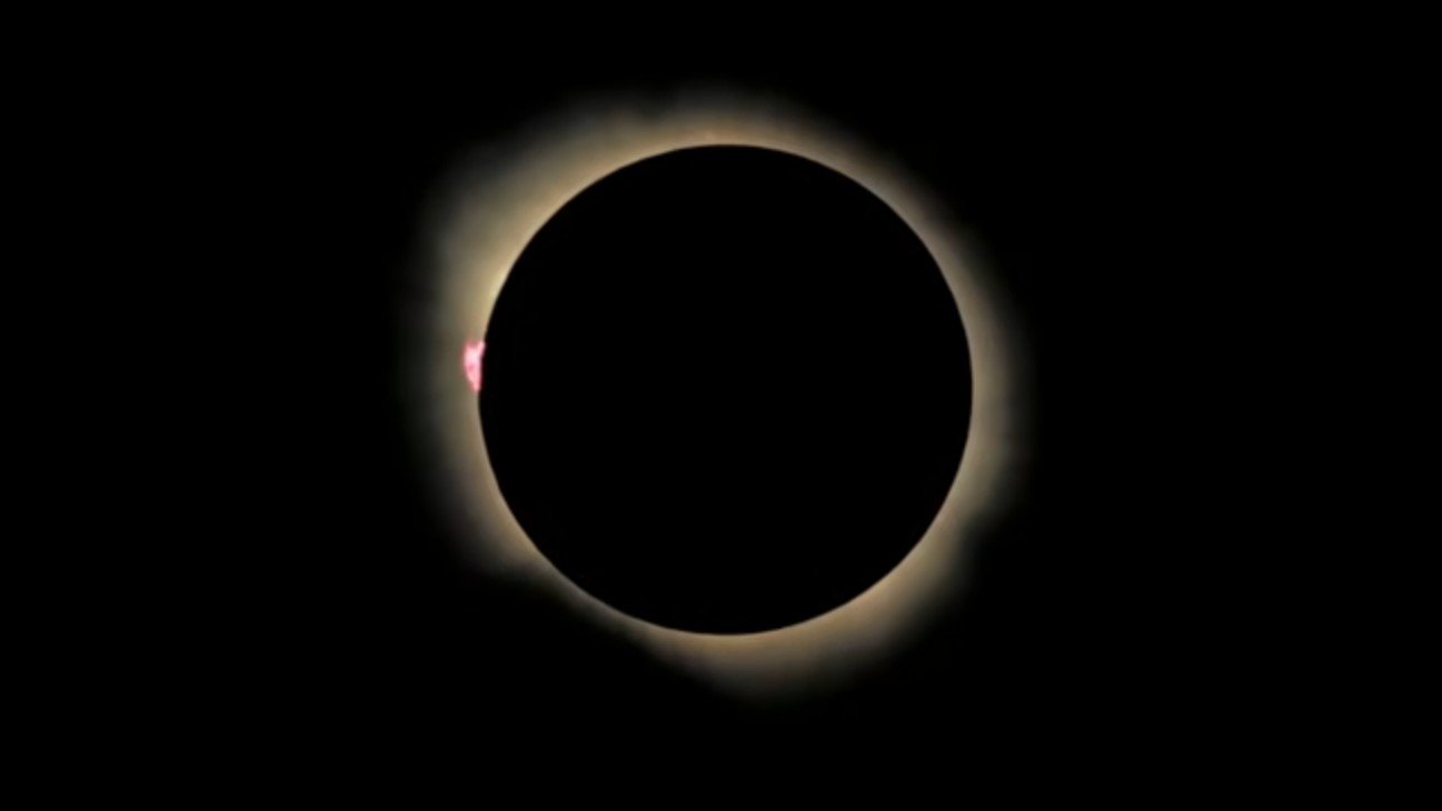 The sun looks like a white diamond ring behind the moon in this total solar eclipse image