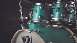 Close-up of Natal Cafe Racer toms and bass drum in green finish
