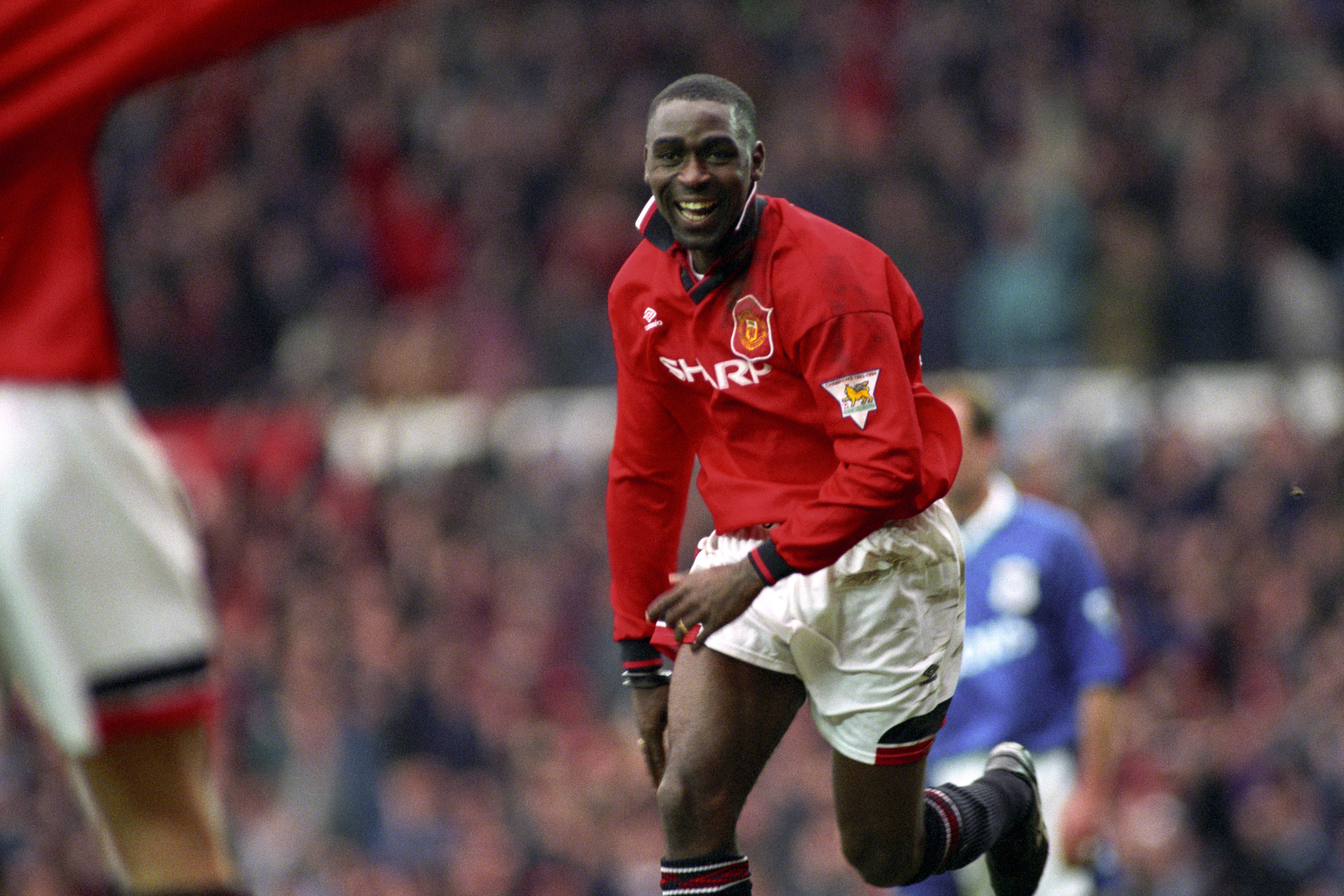 Andy Cole celebrates after scoring for Manchester United against Ipswich Town, March 1995