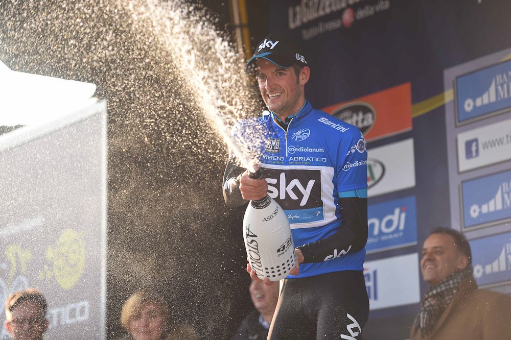 Poels celebrates his win with some champagne