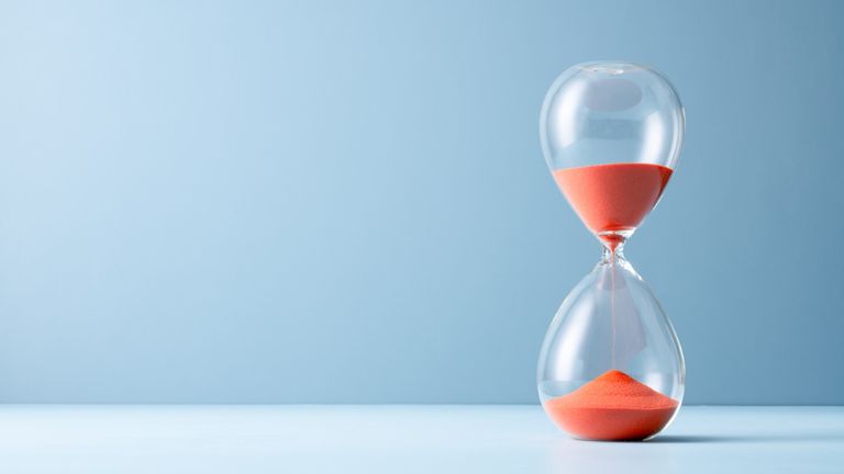 hourglass on a blue background