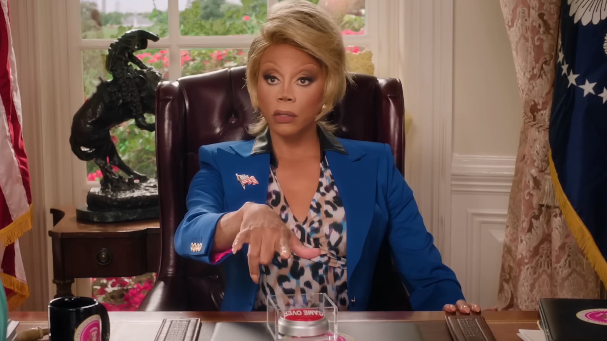 RuPaul Charles is shown as President Judy Gagwell in Stop! That! Train!