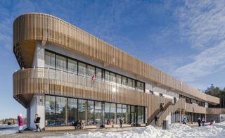 This new sustainable school in Norway features durable kebony wood cladding