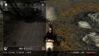 Best Skyrim mods — The player loots a wolf from horseback thanks to a feature added by the mod, Convenient Horses